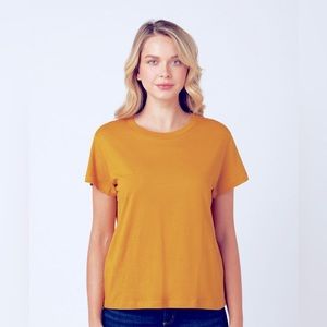 100% cotton USA made, good knit fabric soft comfy mustard color tee "chic" label